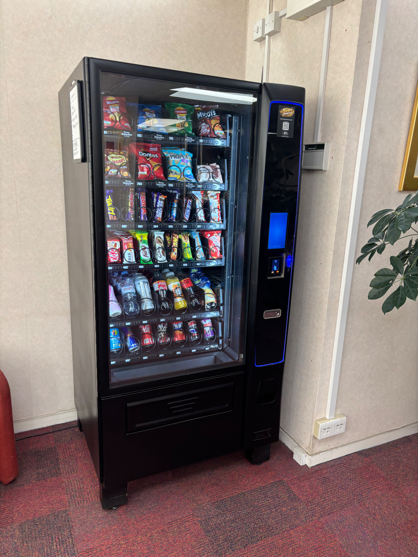 A Swift Snacks vending machine installed at a UK workplace